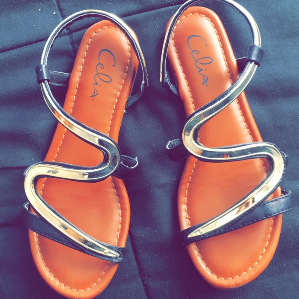 Black and gold sandals